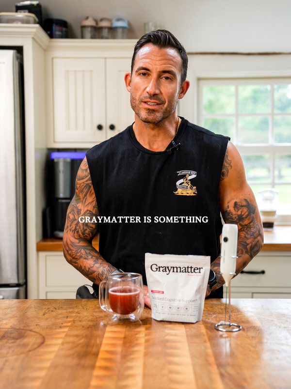 Graymatter video ad: creator at a kitchen counter with the Graymatter bag and a drink